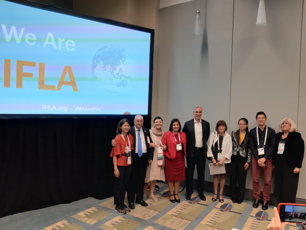 IFLA President Glòria Pérez-Salmerón, Secretary General Gerald Leitner and Past IFLA President Donna Scheeder (centre) with members of the IRRT International Connections Committee